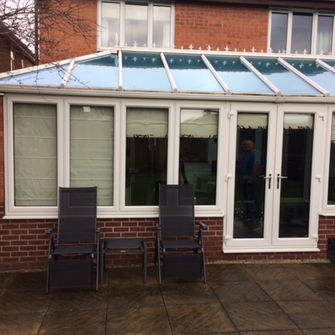 Remove glass roof provide tiled. Form opening install aluminium doors.